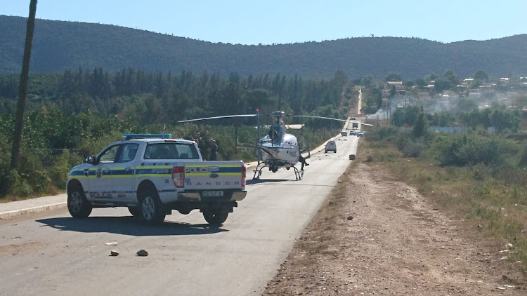 Police were out in full force to establish order as protesters blocked the entrance to the Moses Mabhida township, in Kirkwood