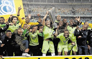 HAPPINESS: Platinum Stars celebrate their MTN8 win against Orlando Pirates 
      Photo: THEMBINKOSI DWAYISA