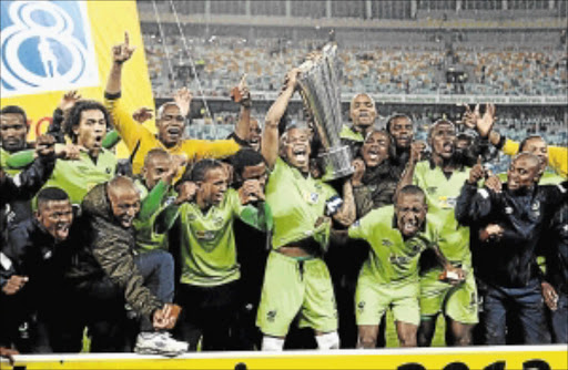 HAPPINESS: Platinum Stars celebrate their MTN8 win against Orlando Pirates Photo: THEMBINKOSI DWAYISA