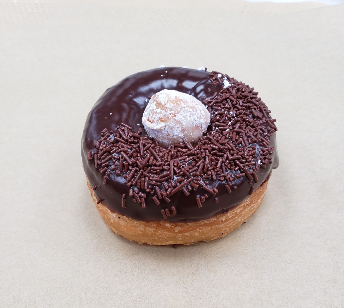 A Cronut with chocolate ganache glaze.... yumi