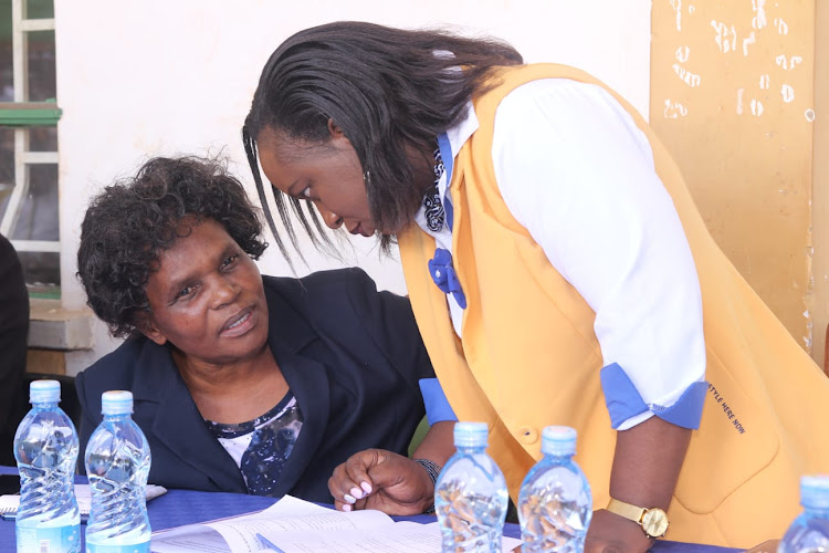 Kakamega county water, environment, natural resources and clime change execjutivbe Rodah Masaviru (L) with acting KACWASCO CEO Christabel Ashiono during a pubic participation forum at the Kakamega county polytechnic on Friday