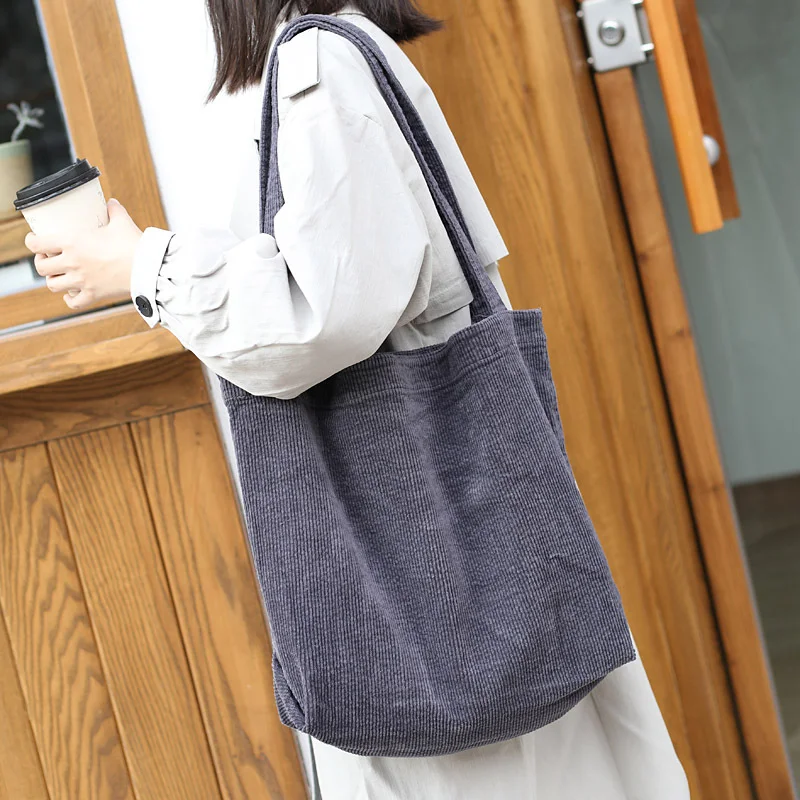 Bolso de mano de lona para mujer, gran capacidad, diseño simple y elegante. Perfecto para uso diario, compras y viajes.