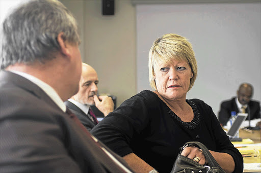 Suspended NPA prosecutor Glynnis Breytenbach with her advocate, Wim Trengove at her disciplinary hearing in Pretoria.