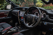 Black and maroon leather adorns the interior of the 2.8 models. 