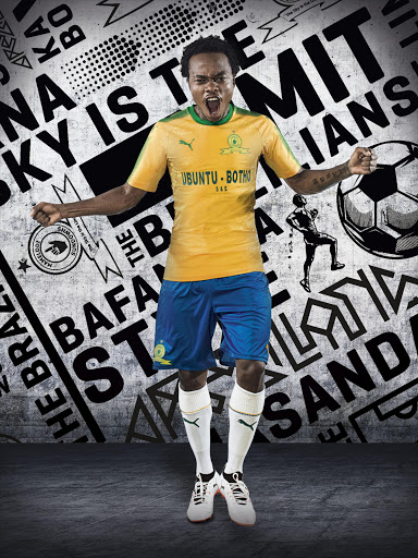 Percy Tau in traditional Brazil colours.