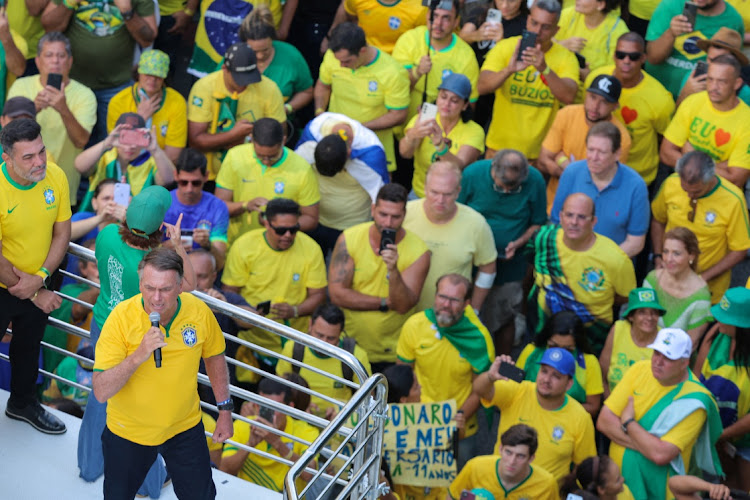 Brazil's former president Jair Bolsonaro speaks during a protest where he called his supporters to gather in Paulista Avenue, as police investigate him and his cabinet for allegedly plotting a coup after the 2022 election, in Sao Paulo, Brazil, February 25, 2024.