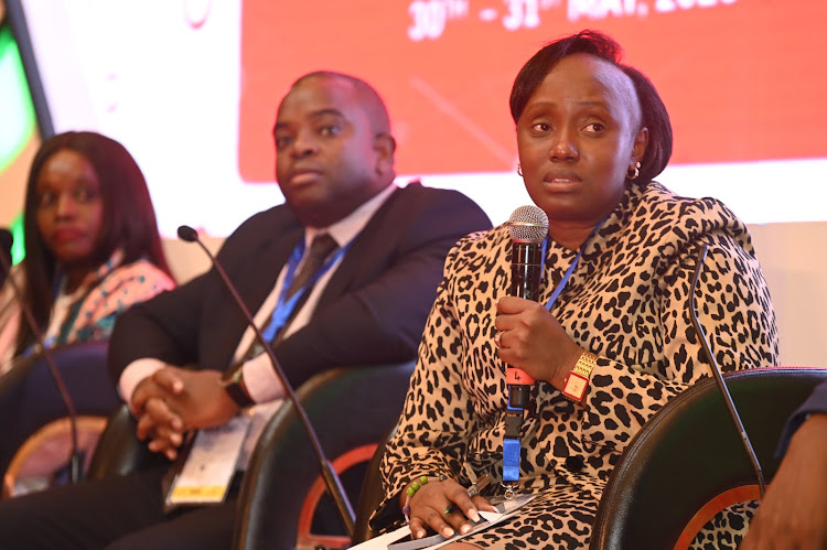 Kenya Development Corporation Acting Director General Norah Ratemo during a panel discussion on unlocking the challenges facing African economies.