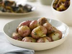 Oven Roasted Red Potatoes with Rosemary and Garlic was pinched from <a href="http://www.foodnetwork.com/recipes/paula-deen/oven-roasted-red-potatoes-with-rosemary-and-garlic-recipe/index.html" target="_blank">www.foodnetwork.com.</a>