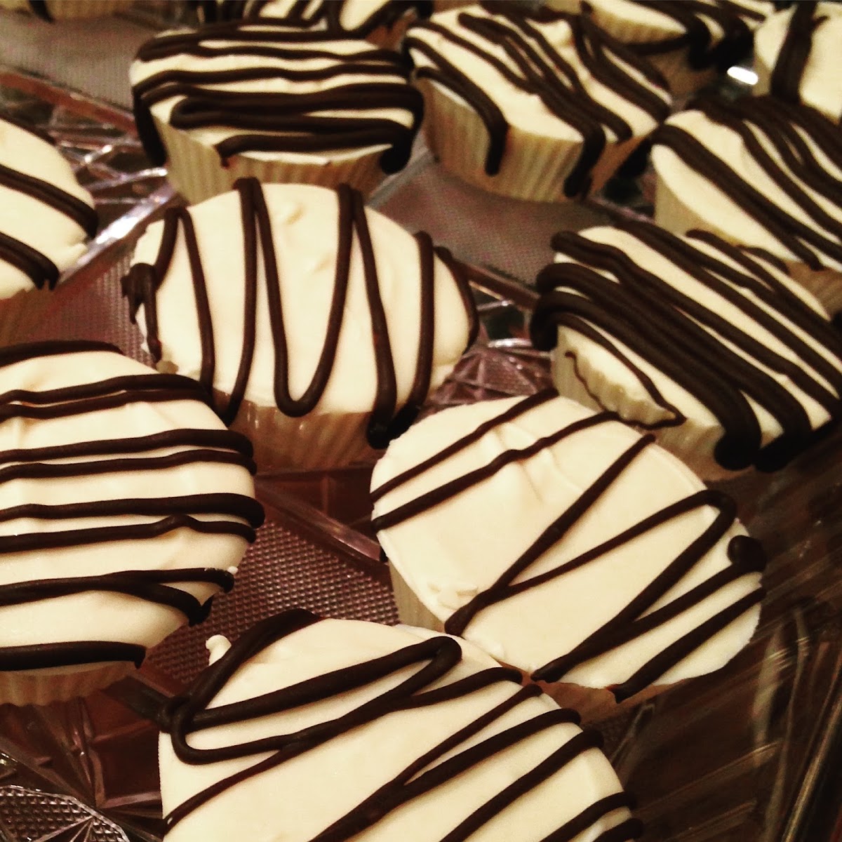 Gluten free made from scratch peanut butter cups. They come in white, milk and dark chocolate.