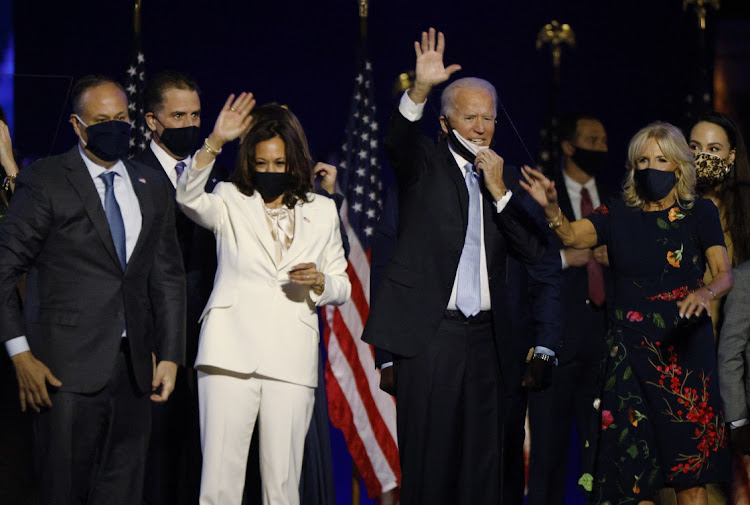 US president Joe Biden and his wife Jill, and vice president-elect Kamala Harris and her husband Doug, celebrate at their election rally in Wilmington, Delaware, US