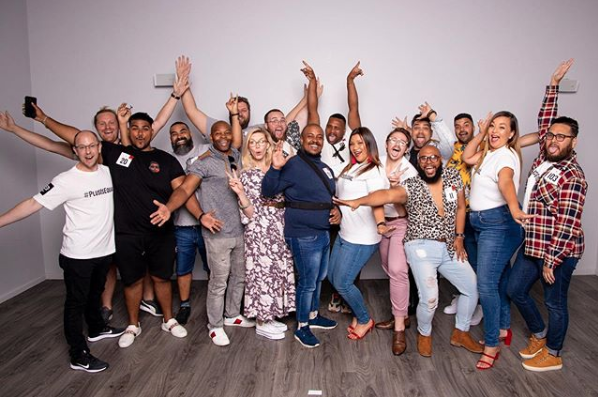 The top 13 male models celebrate before they participate in SA's first male plus-size fashion show.