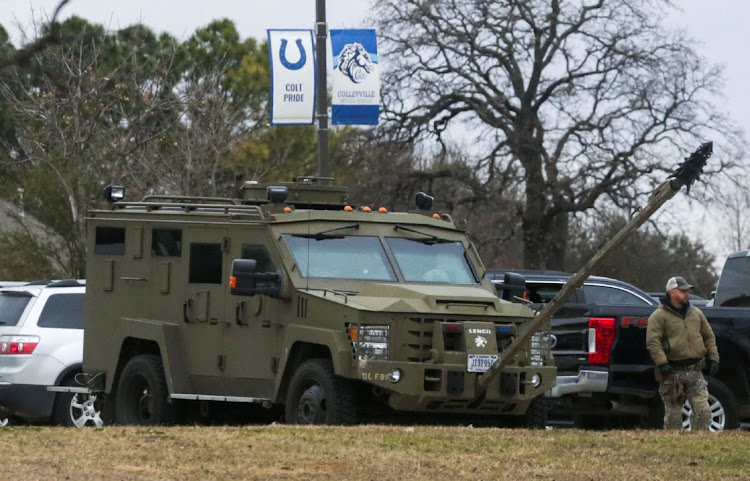 An armored law enforcement vehicle is seen in the area where a man taken people hostage at a synagogue during services that were being streamed live, in Colleyville, Texas, U.S. January 15 2022.