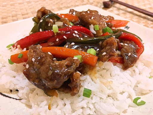 Strips of crispy beef in a beautiful ginger sauce along with fresh vegetables.