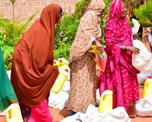 Elderly women from Wajir town receive their food donation courtesy of Wajir governor aspirant Siyad Abdullahi