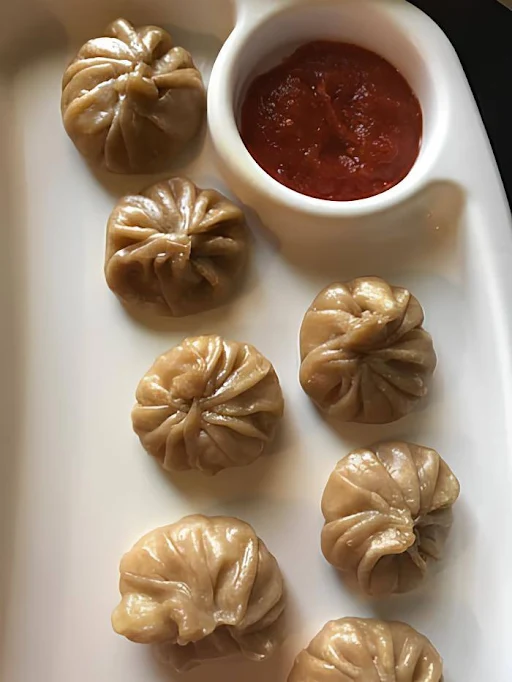 Veg. Red Thai Curry Steam Wheat Momos (6 Pcs)