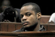 Mitspa Oyoka in the dock in the Cape Town high court earlier in his trial. File photo.