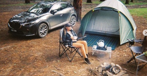  Marny Kennedy enjoying Campfire besides her car