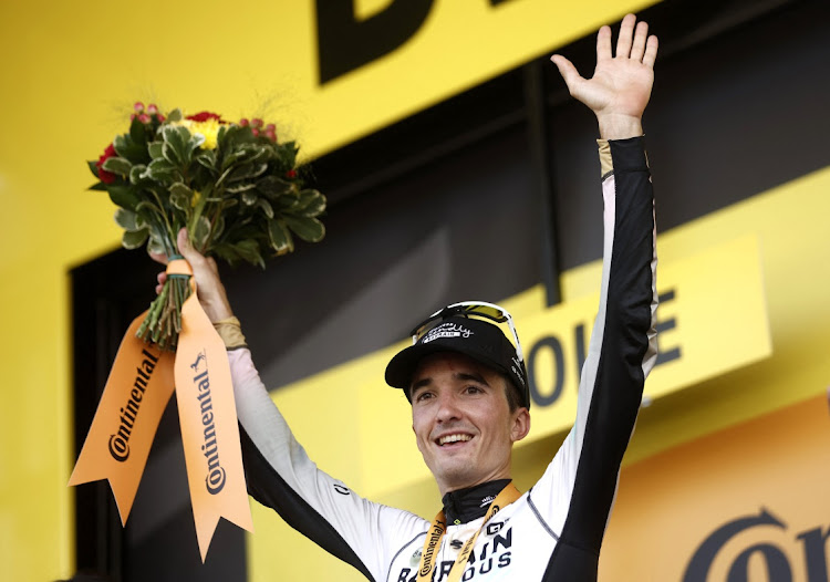 Tour de France - Stage 10 - Vulcania to Issoire - France - July 11, 2023 Team Bahrain Victorious' Pello Bilbao Lopez celebrates on the podium after winning stage 11 REUTERS/BENOIT TESSIER