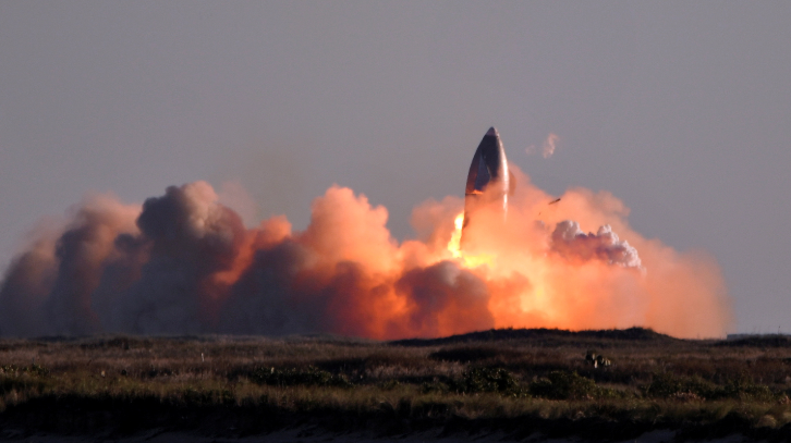 SpaceX's first super heavy-lift Starship SN8 rocket explodes during a return-landing attempt after it launched from their facility on a test flight in Boca Chica, Texas US on December 9 2020.