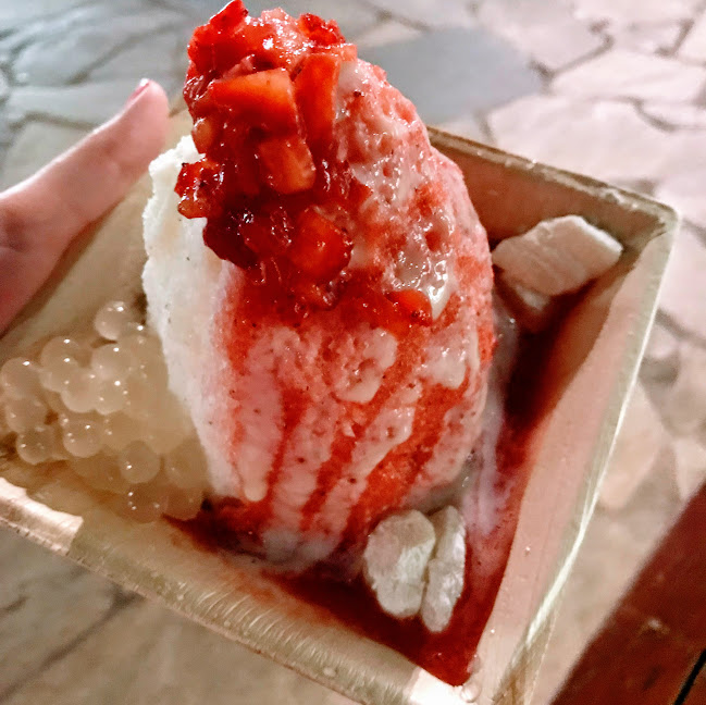 Pink Island shave ice with strawberry, lychee mint, vanilla gelato, fresh strawberries, mochi, lychee popping boba, and condensed milk snow cap, Island Vintage Shave Ice (Honolulu)