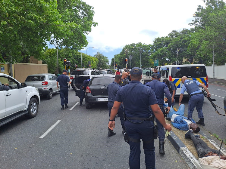 Three firearms were discovered in the vehicle when it was brought to a halt in Claremont.