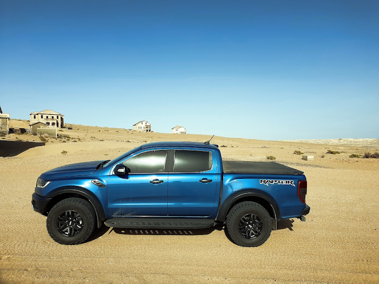 The Ford Raptor at the eerie but beautiful Kolmanskop ghost town in Namibia.