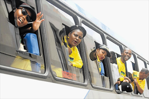 CELEBRATION: Some of the ANC members who boarded a bus to the North West rally from East London yesterday afternoon Picture: SIBONGILE NGALWA