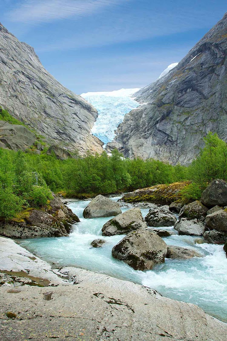 Briksdalsbreen is an arm of the Jostedalsbreen glacier in Jostedalsbreen National Park, north of Bergen, Norway.