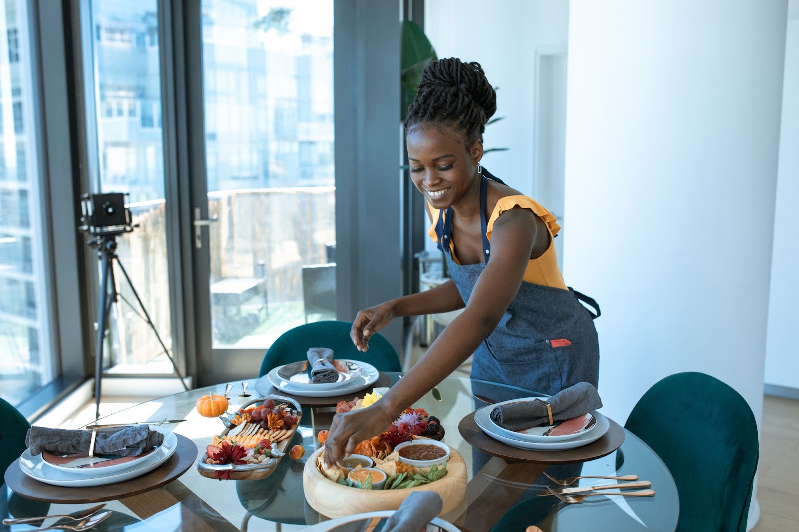 An image of a female food blogger depicting food blogging as one of the innovative food business ideas.
