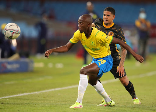 Keegan Dolly of Kaizer Chiefs challenged by Peter Shalulile of Mamelodi Sundowns during the DStv Premiership match between the two sides at Loftus Versfeld Stadium on September 12 2021 in Pretoria.