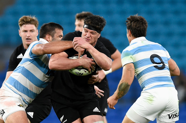 Scott Barrett of the All Blacks (C) is tackled during the Rugby Championship match between New Zealand and Argentina. Picture: MATT ROBERTS