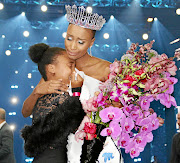 Zozibini Tunzi with her sister Ayakha. She says beauty in world pageants has been westernised./Supplied