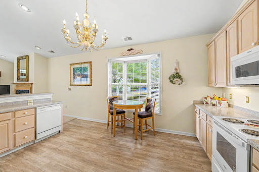 Bright kitchen with dining area - Buy this luxury house in Galloway, 3 bedrooms