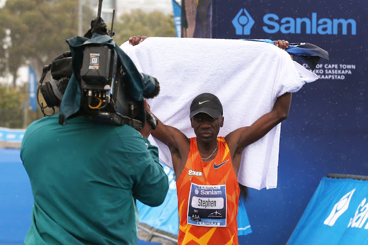 Stephen Mokoka of South Africa wins the 2021 Sanlam Cape Town Marathon in Cape Town.