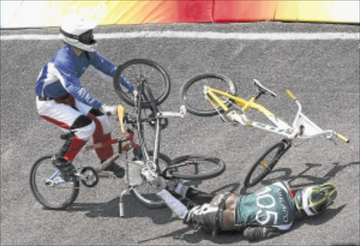 GROUNDED: Sifiso Nhlapo crashes during the men's final run of the BMX cycling competition at the Beijing 2008 Olympic Games in 2008. photo: REUTERS