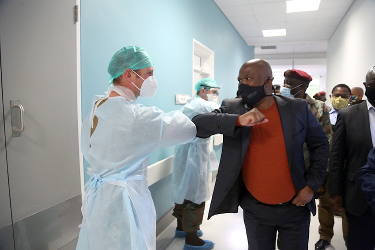 Eastern Cape premier Oscar Mabuyane greeting doctors at Cecilia Makiwane Hospital