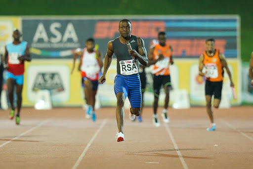 Akani Simbine anchors the mens 4x100m relay home during the ASA Speed Series 4 at Germiston Stadium on March 22, 2017 in Johannesburg, South Africa.