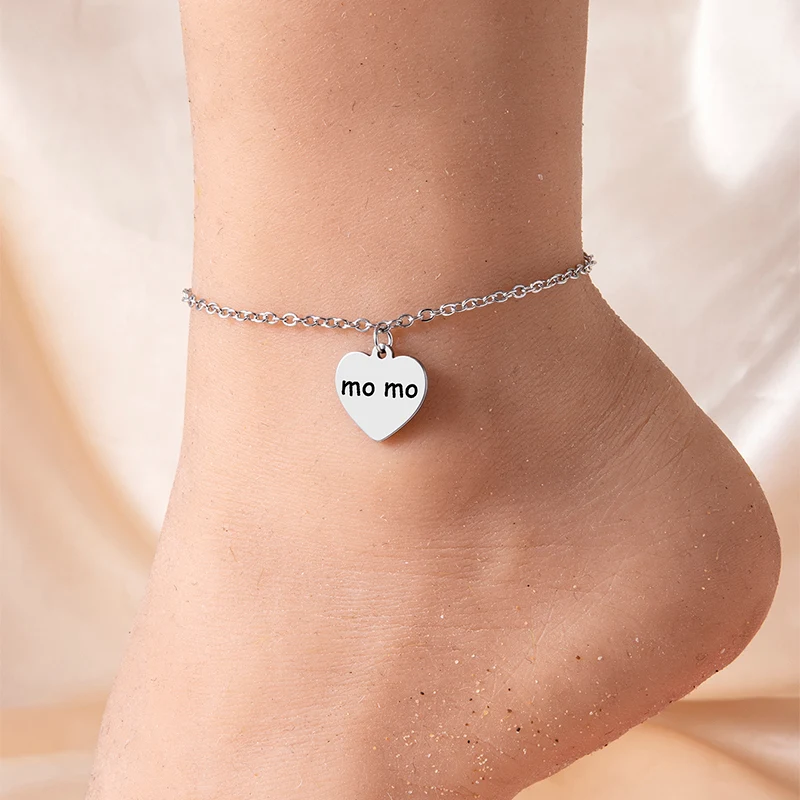 Nouveau Bracelet de cheville 2023 Pendentif Coeur Pêche Argent Acier Inoxydable pour un style élégant et féminin. Parfait pour l'été. Commandez!