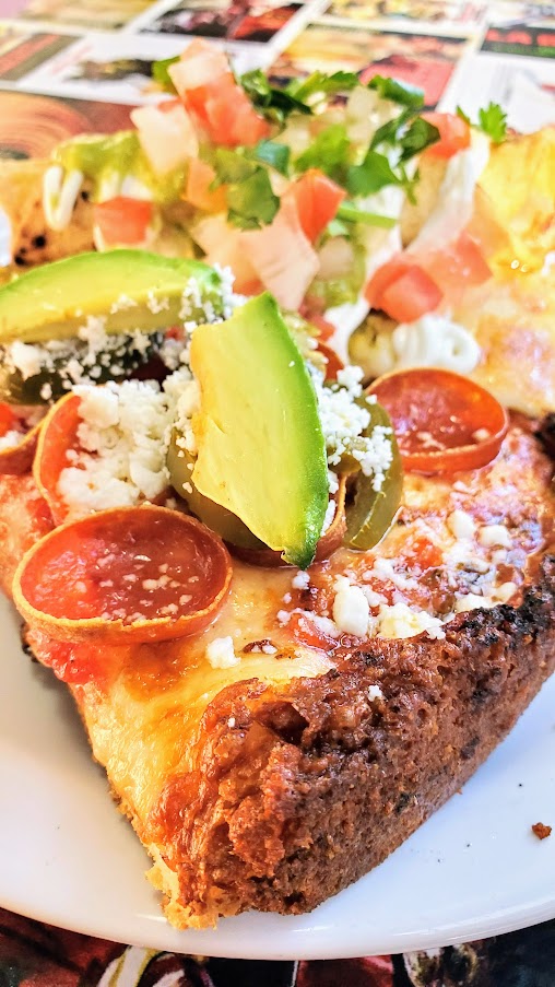 Pan Pizza in Downtown Portland from Zapapizza: their Mexican twist on the pepperoni takes the regular pepperoni and adds Pickled Jalapeños, Queso Fresco, and Avocado for only 50 cents more a slice - so why wouldn't you?