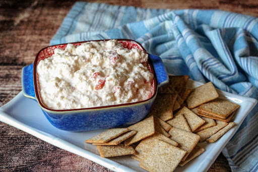 Crab and Roasted Red Pepper Spread with crackers.