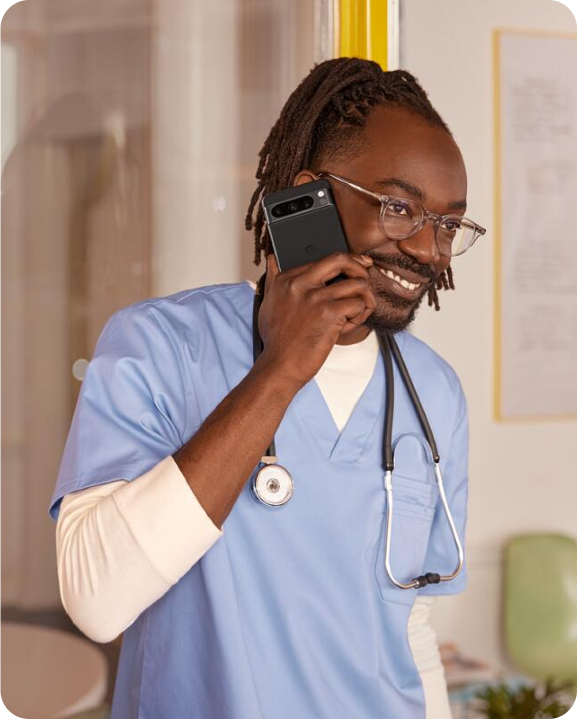 A doctor taking a call on his Pixel phone.