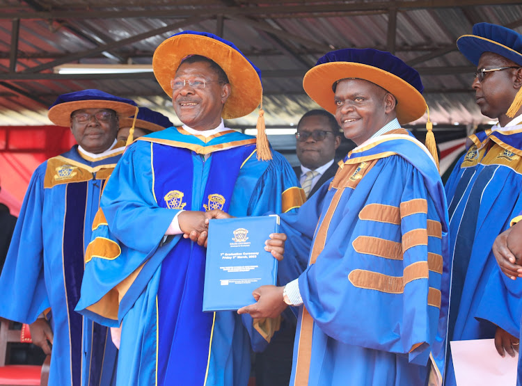 National Assembly Speaker Moses Wetangula holding his certificate of honorary degree of Doctorate in Humane Letters on March 3,2023.