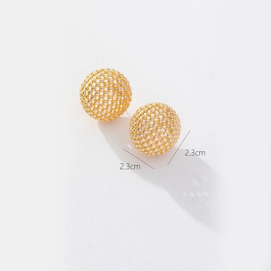 Goudkleurige oorbellen met een licht luxe design, holle bal, niche-stijl, elegant en eenvoudig, perfect voor een stijlvolle en verfijnde uitstraling.
