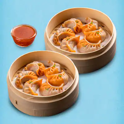 Steamed Schezwan Chicken Momos With Momo Chutney - 12 Pcs