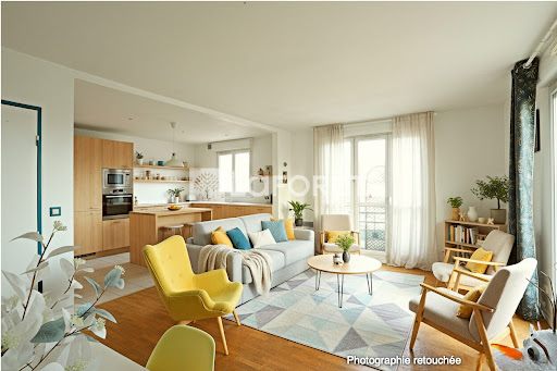Open living room and kitchen with modern furniture in this luxury apartment / penthouse for sale in Montrouge ($606,082 - 61 m²)