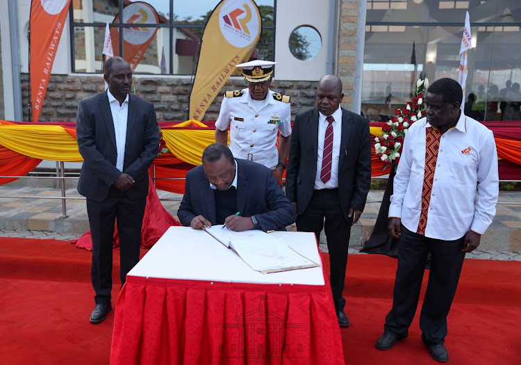 President Uhuru Kenyatta sign off the commissioning of the new ultra-modern Kisumu Railway Station on August 1, 2022.