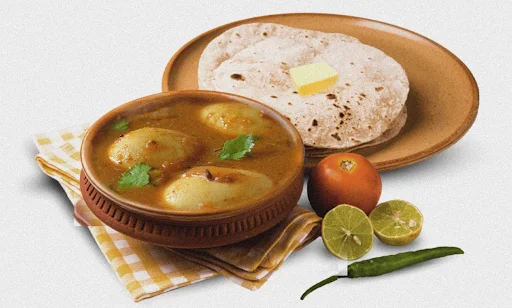 Egg Curry [250 Ml, 2 Eggs] With 4 Butter Roti