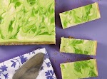 Key Lime Swirl Cheesecake Bars was pinched from <a href="http://www.confessionsofacookbookqueen.com/2011/05/guest-post-key-lime-swirl-cheesecake-bars/" target="_blank">www.confessionsofacookbookqueen.com.</a>