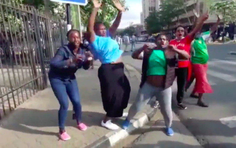 Women protesting. Screengrab from NTV