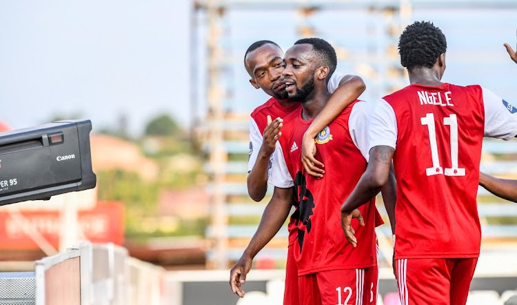 Justin Shonga of Tshakhuma celebrates with teammates after scoring the only goal agianst Baroka at Thohoyandou Stadium on Sunday.